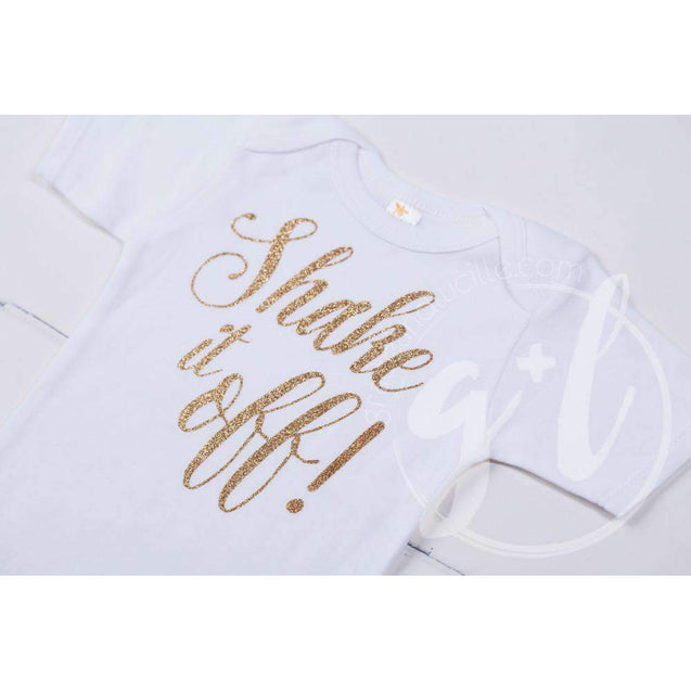 White Onesie with "SHAKE IT OFF!" Gold Graphics - Grace and Lucille