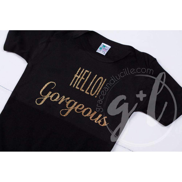 Black Onesie with "HELLO GORGEOUS" Gold Graphics - Grace and Lucille